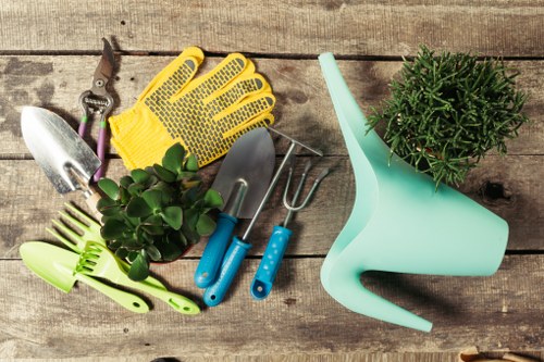 Gardener working in a Highbury terraced garden